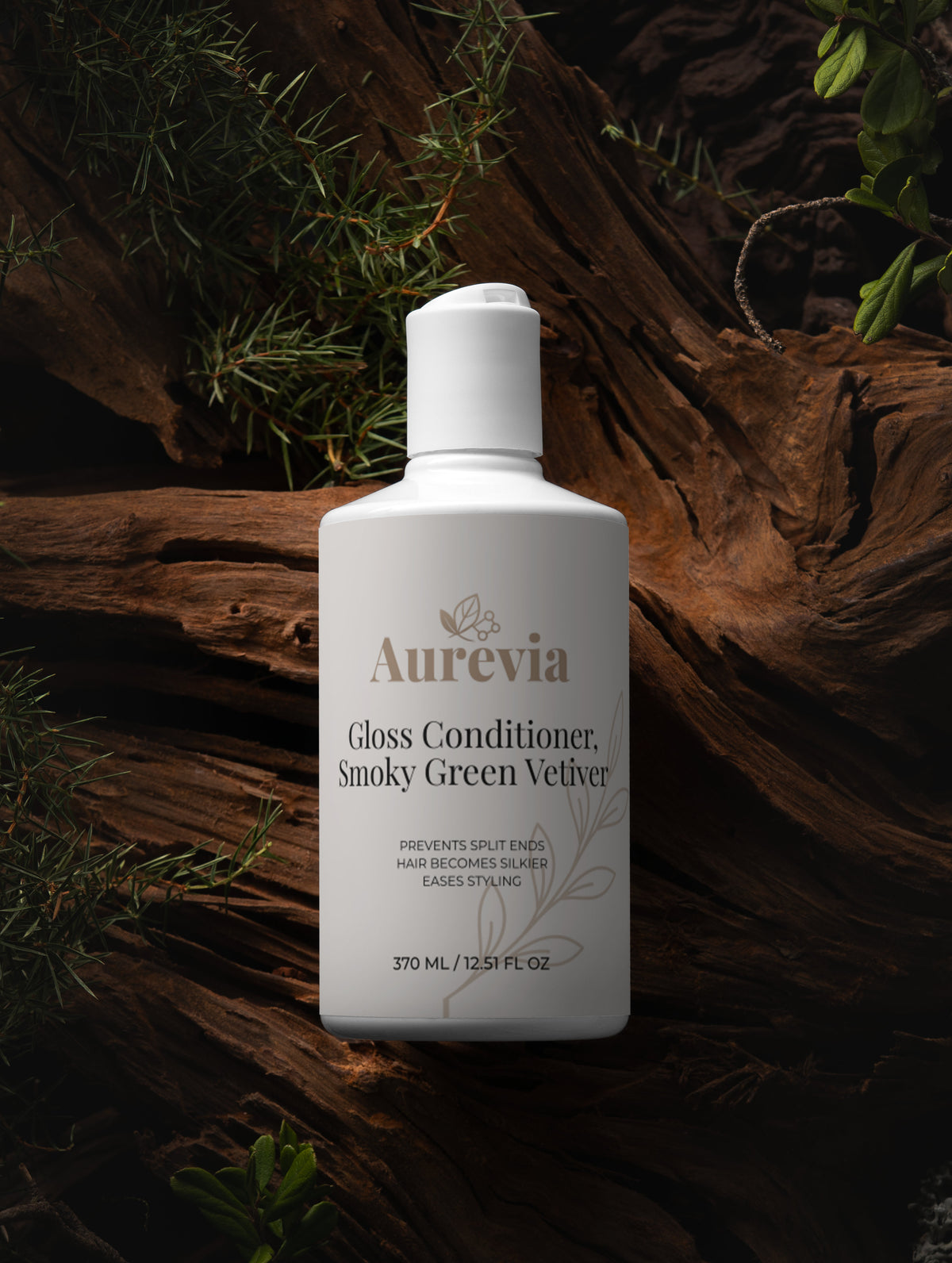 Aurevia Gloss Conditioner, Smoky Green Vetiver — prevents split ends, silkiest hair, eases styling on rustic wood with greenery
