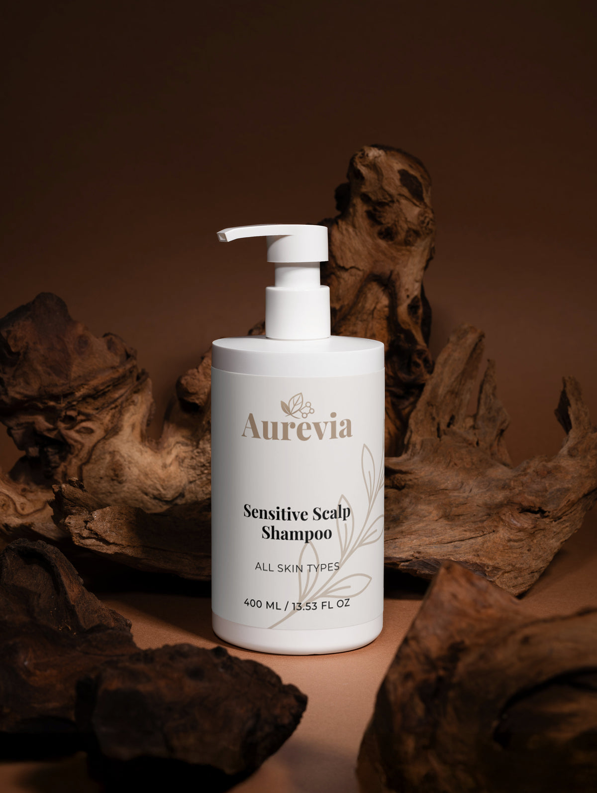 Aurevia Sensitive Scalp Shampoo for all skin types, 400ml bottle with pump dispenser on rustic wood background