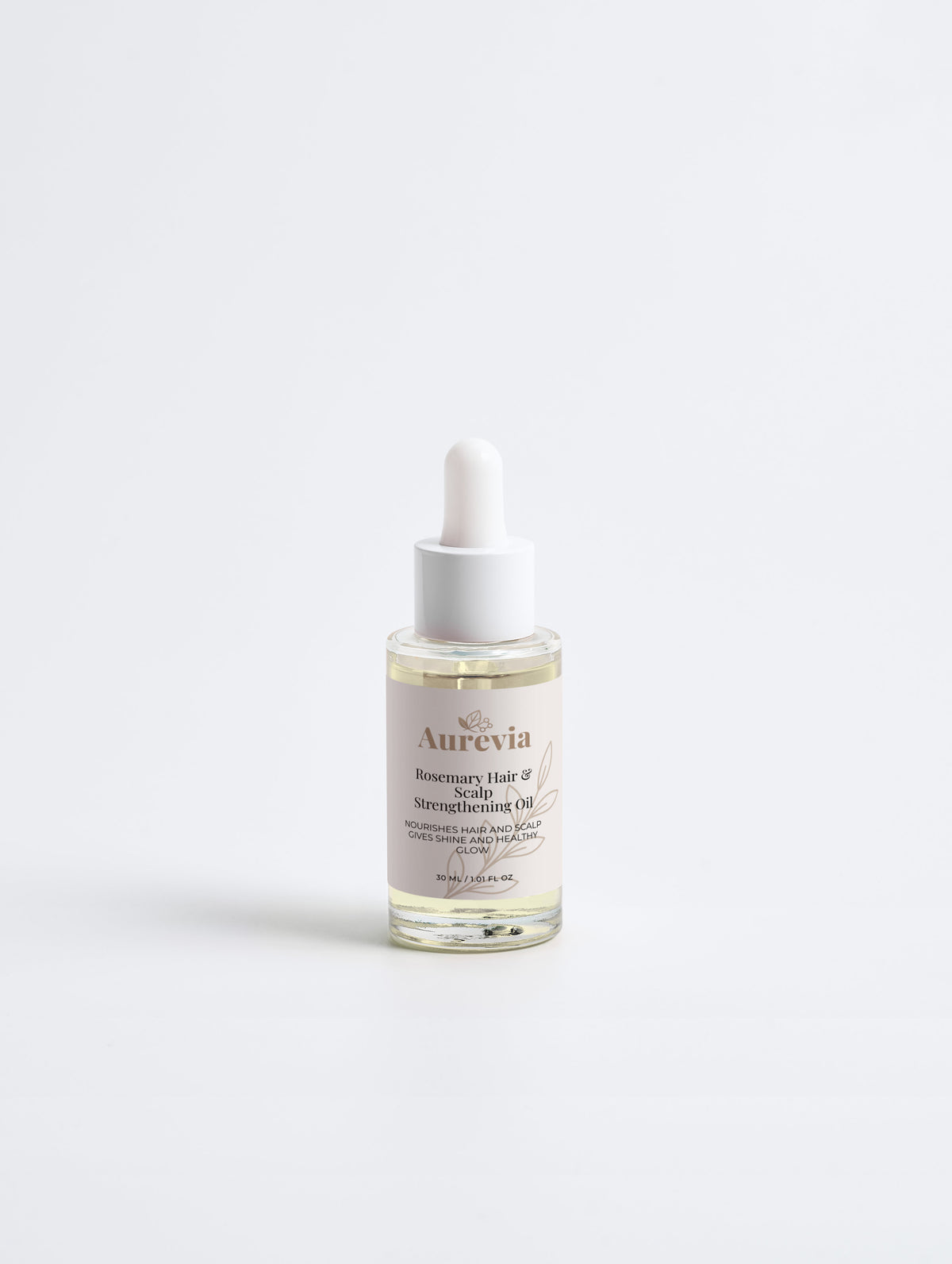 Rosemary Hair & Scalp Strengthening Oil in clear glass bottle with dropper, nourishes for shine and healthy glow